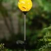 Hot Sale ✔️ Evergreen Yellow Swirl Solar Garden Stake 🤩