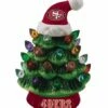 Best Pirce ✔️ Evergreen San Francisco 49ers Green Tree & Santa Hat LED Light-Up Ornament 🧨