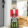 Deals 😍 Evergreen Red & Green Nutcacker Leaning Porch Sign 🧨