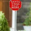 Coupon 🔔 Evergreen Red 'Santa Stops Here' Distressed Metal Garden Stake 🥰